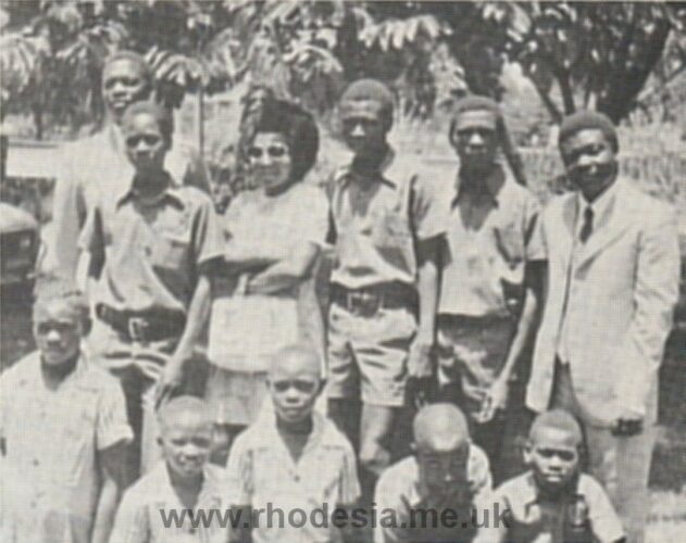 Takwirira School group: assistant headmaster Mwena at rear left, Miss Chatema in centre and headmaster Sithole far right.